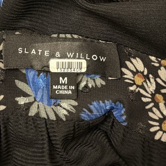 Slate and Willow Black Floral Halter
Mini Dress - Picture 4 of 8